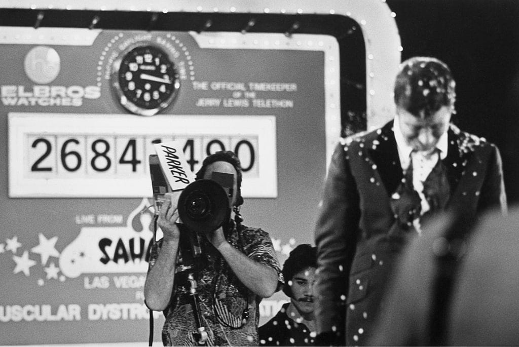 Jerry Lewis - Comic Telethon for the Muscular Dystrophy Association, cries as he learns funds passed $26 million mark.