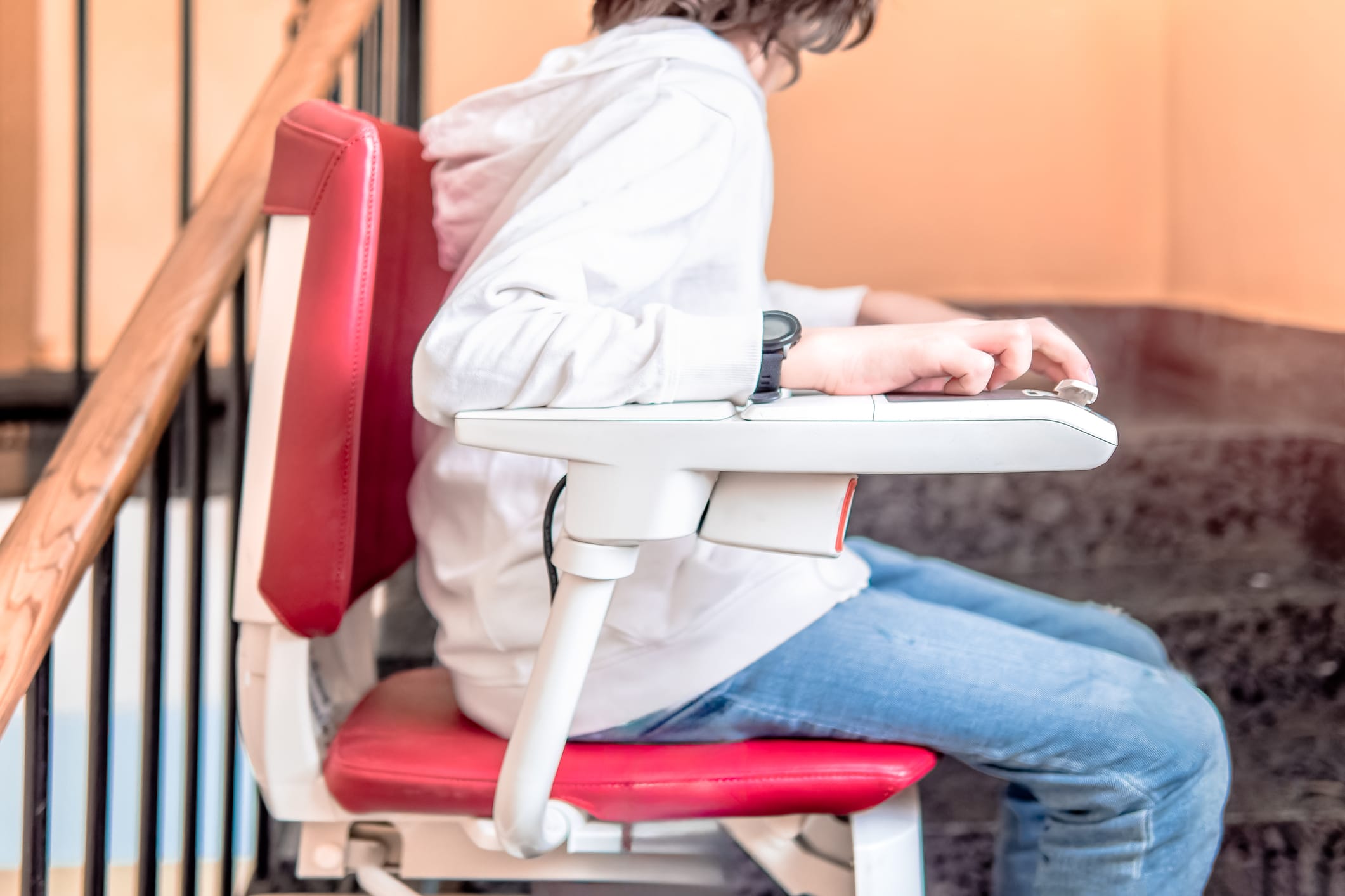 Photo of boy in stairlift