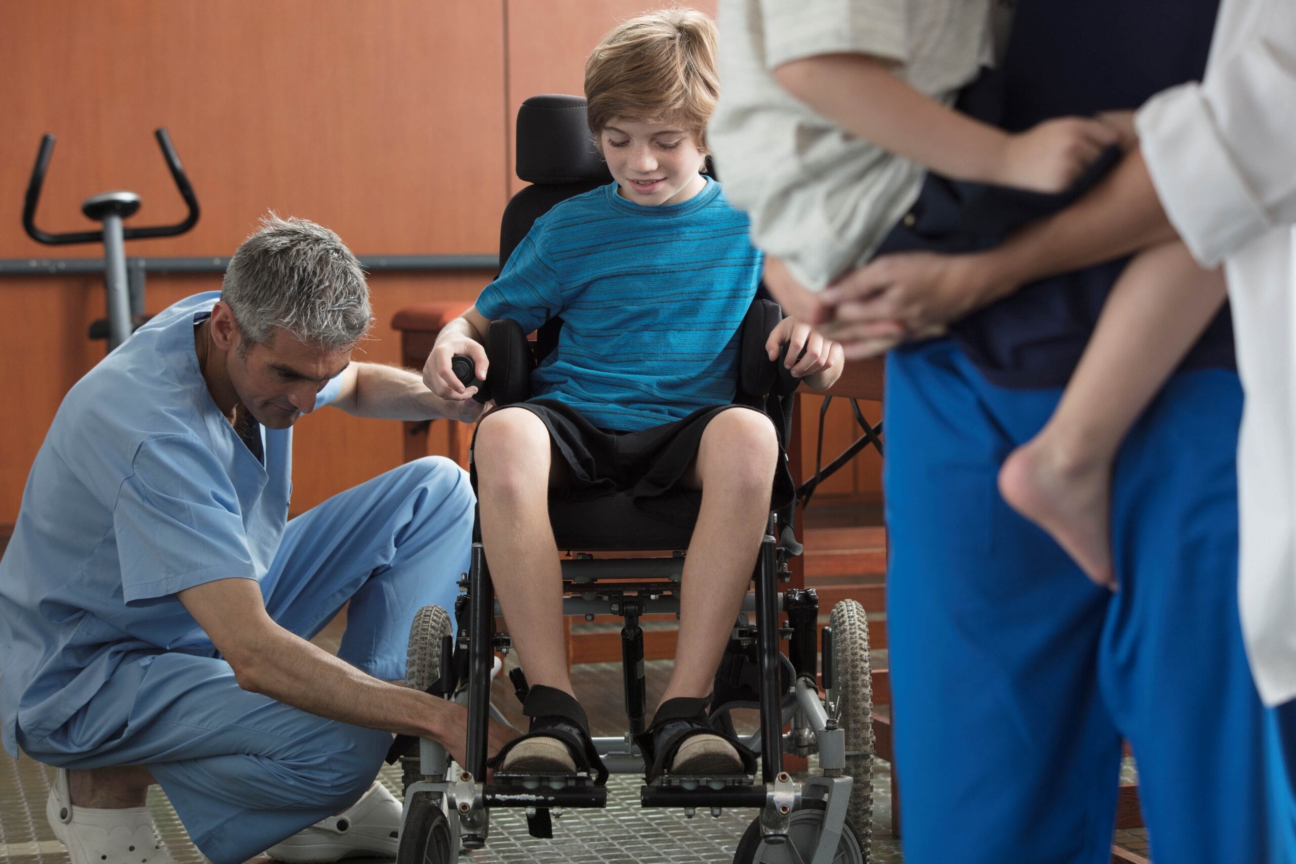 Child being fitted for a wheelchair