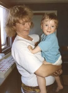 Trude Steen holds her son, Mats, at their home in Oslo, Norway. Mats would later be diagnosed with DMD