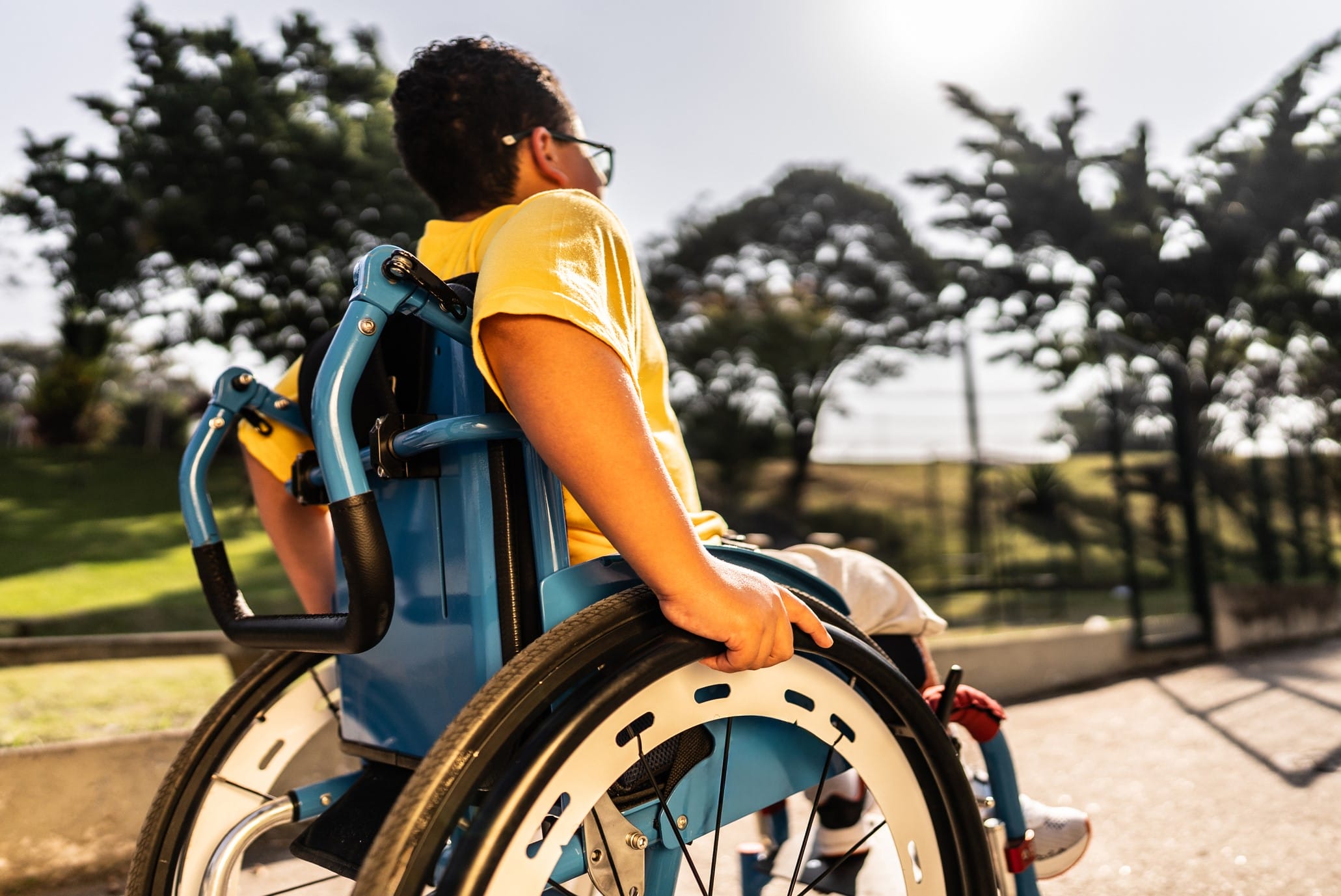 Teen boy in wheelchair